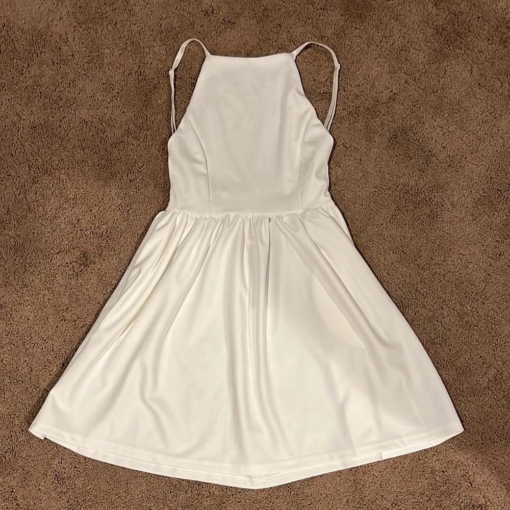 Brand new white dress for sale. Has pockets!